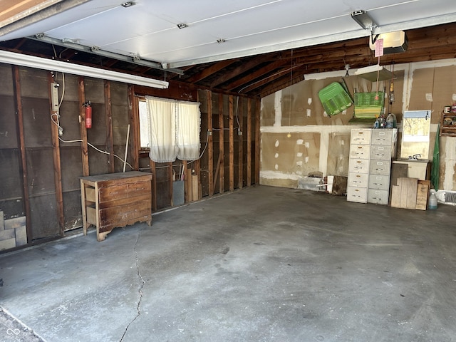 garage featuring a garage door opener