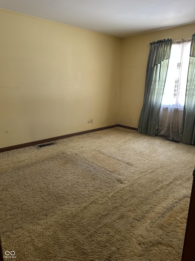 view of carpeted spare room