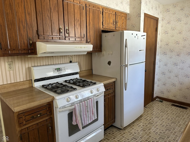 kitchen featuring white appliances