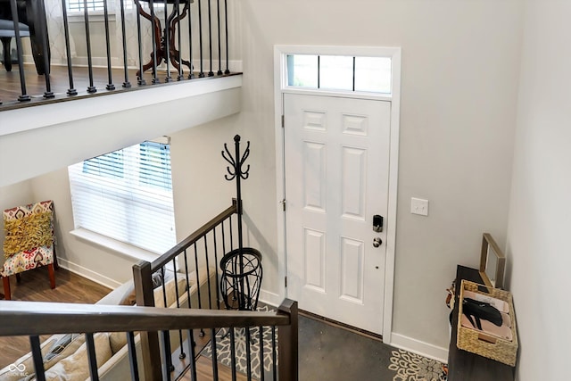 entrance foyer featuring dark hardwood / wood-style floors