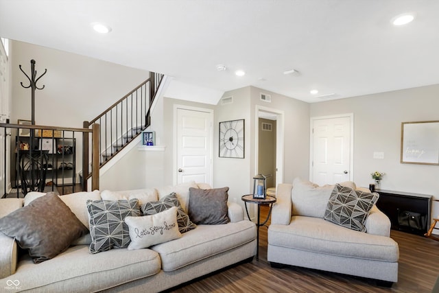 living room with dark hardwood / wood-style floors