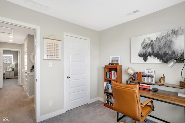 home office with light colored carpet