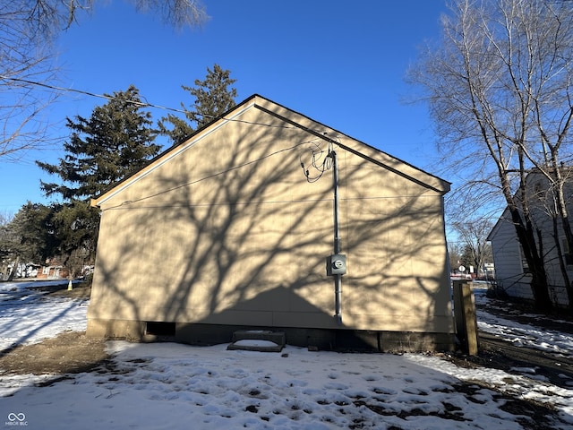 view of snow covered property