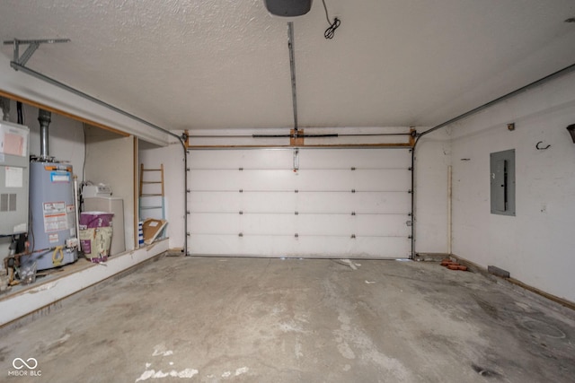 garage with electric panel, washer / dryer, heating unit, and gas water heater