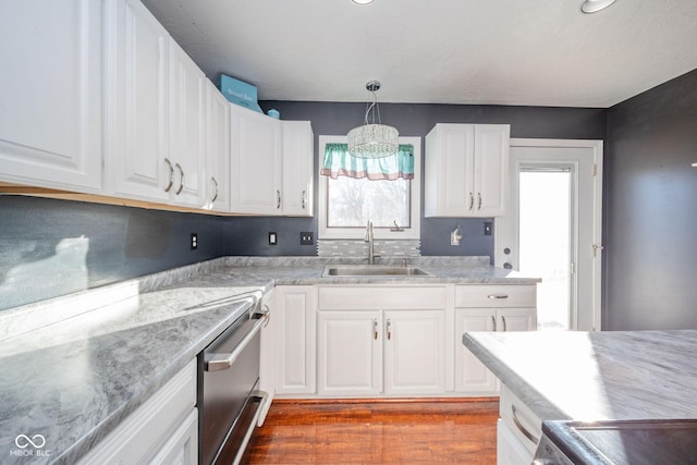 kitchen with sink and white cabinets