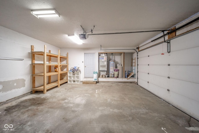 garage with a garage door opener and water heater