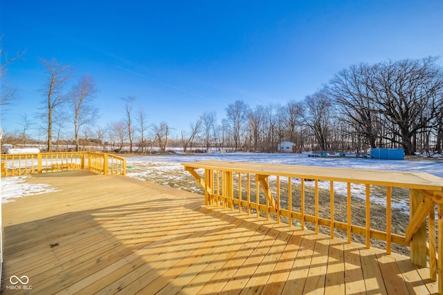 view of snow covered deck