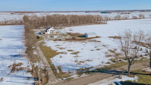 snowy aerial view with a rural view