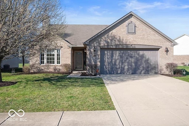 ranch-style home featuring a garage and a front yard