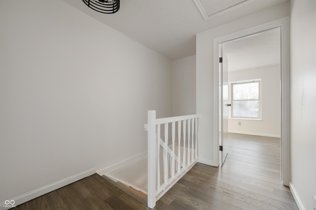 corridor featuring hardwood / wood-style floors