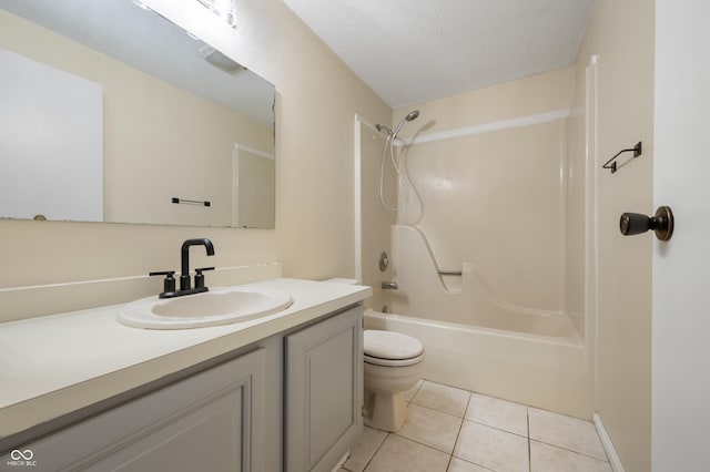 full bathroom with shower / tub combination, tile patterned flooring, vanity, toilet, and a textured ceiling