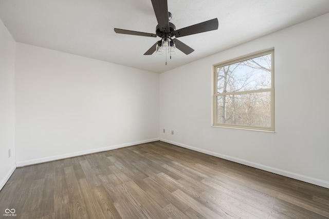 unfurnished room with ceiling fan and light hardwood / wood-style floors