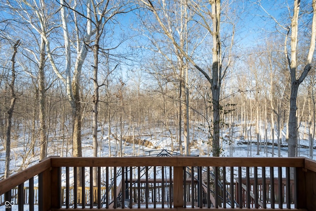 view of snow covered deck