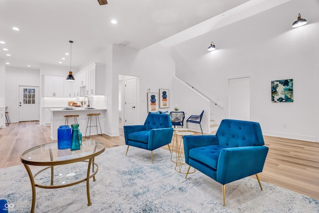 interior space with sink and light wood-type flooring