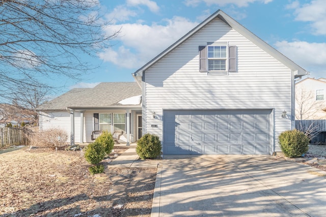 view of front property with a garage and covered porch