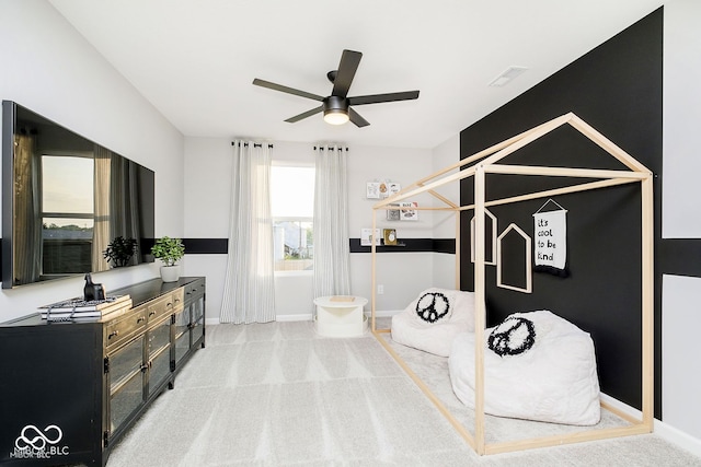 bedroom featuring visible vents, baseboards, and light colored carpet