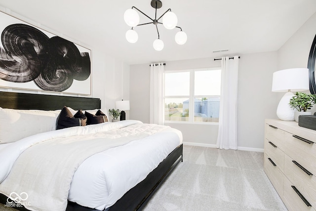 bedroom featuring visible vents, baseboards, light colored carpet, and an inviting chandelier