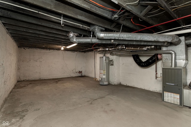 basement with water heater and heating unit