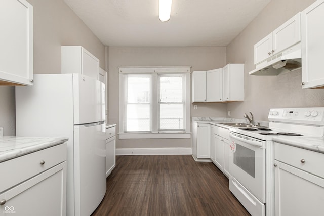 kitchen with white cabinetry and white appliances