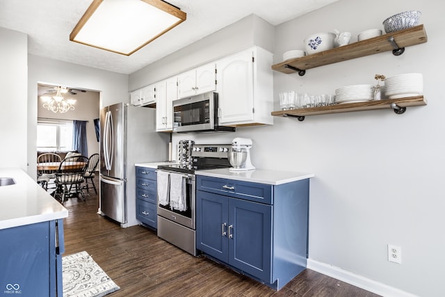 kitchen featuring white cabinetry, appliances with stainless steel finishes, dark hardwood / wood-style flooring, and blue cabinets