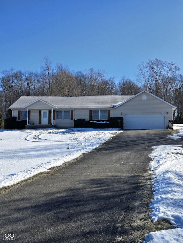 single story home with a garage