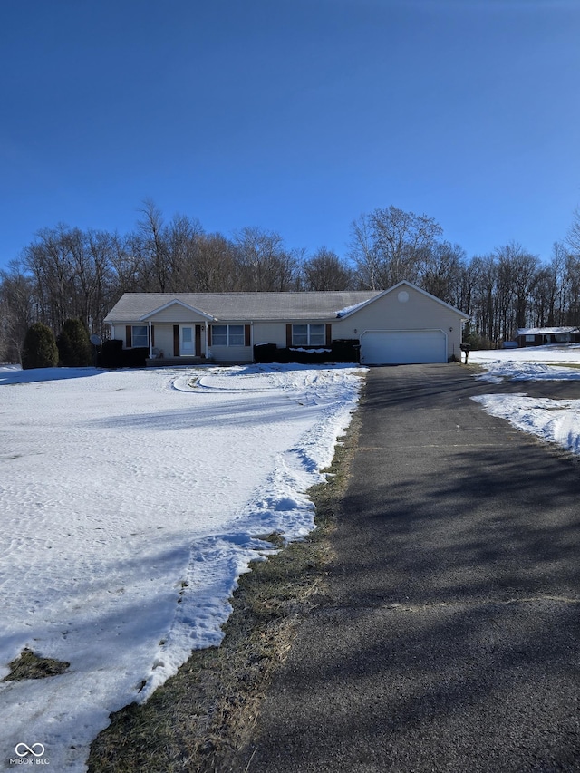 single story home with a garage