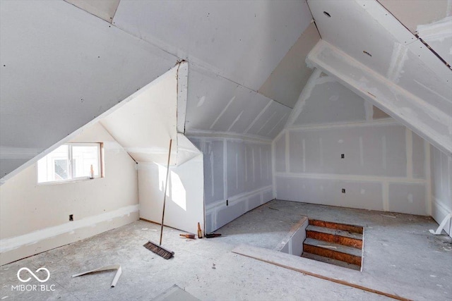 bonus room featuring lofted ceiling