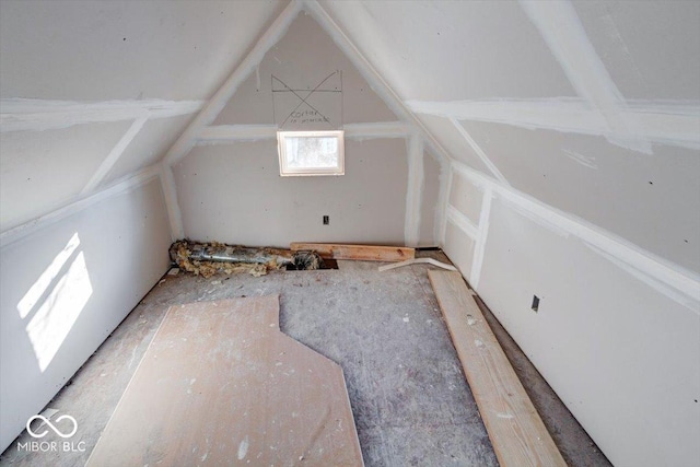 additional living space featuring vaulted ceiling