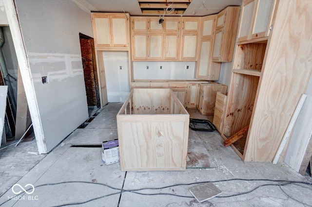 kitchen featuring light brown cabinets