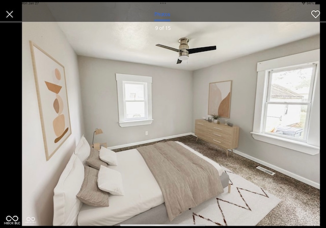 bedroom with ceiling fan and carpet