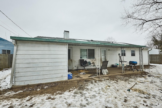 view of snow covered property