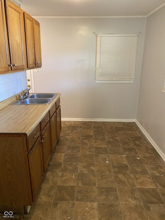kitchen with sink and decorative backsplash