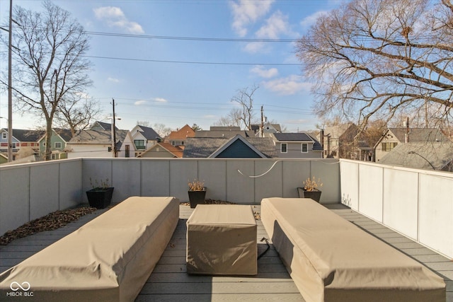 wooden deck featuring outdoor lounge area