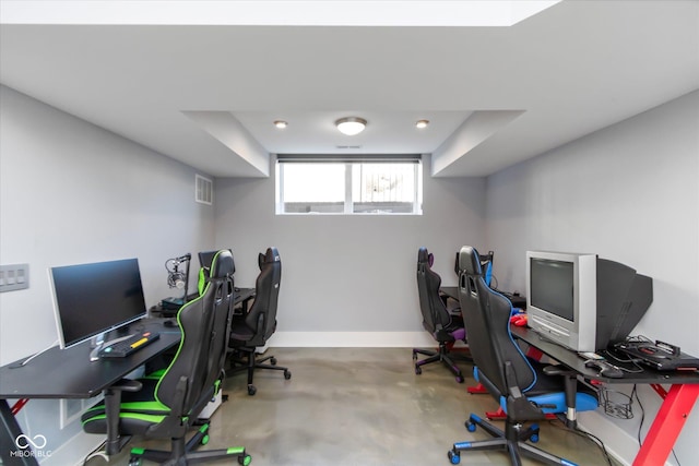 office space featuring concrete floors