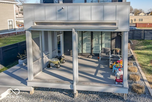 exterior space featuring a sunroom