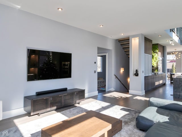 living room featuring a chandelier