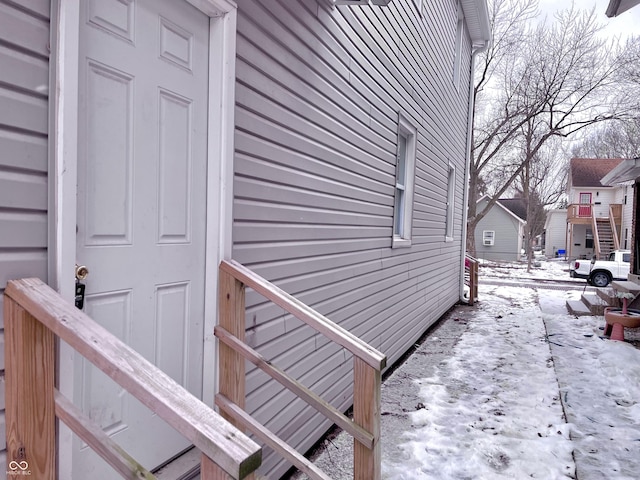 view of snow covered property