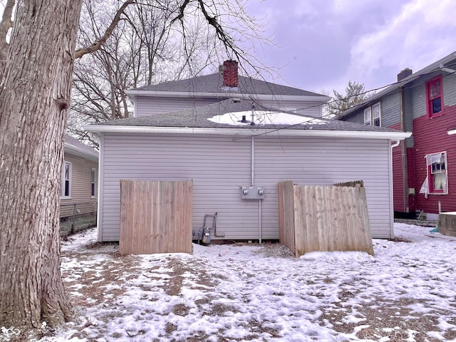 view of snow covered house