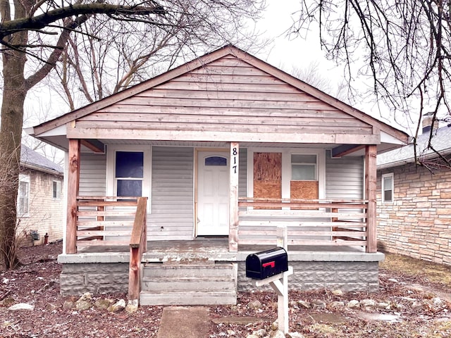 bungalow-style home featuring a porch