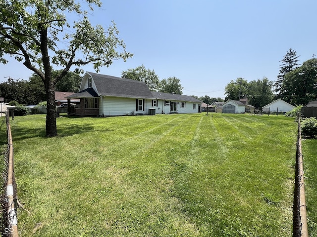 1175 Central Ave, Noblesville, IN 46060 - rear view of property with a shingled roof and cooling unit