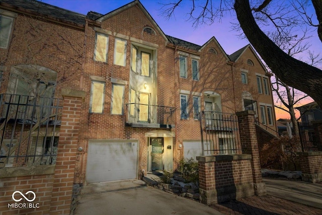 view of front of property with a garage