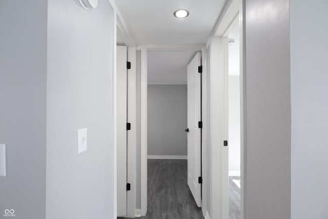 corridor with dark hardwood / wood-style floors