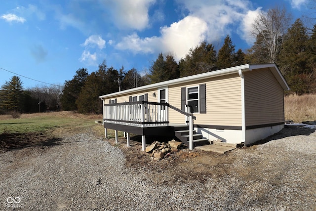 manufactured / mobile home featuring a wooden deck