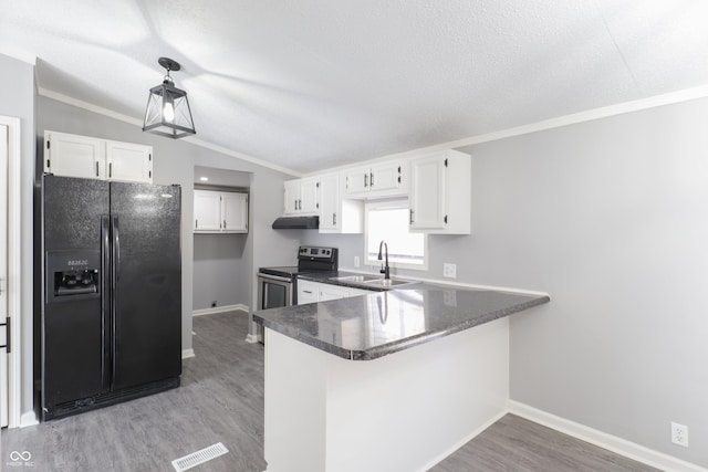 kitchen with sink, white cabinets, kitchen peninsula, black refrigerator with ice dispenser, and stainless steel electric range