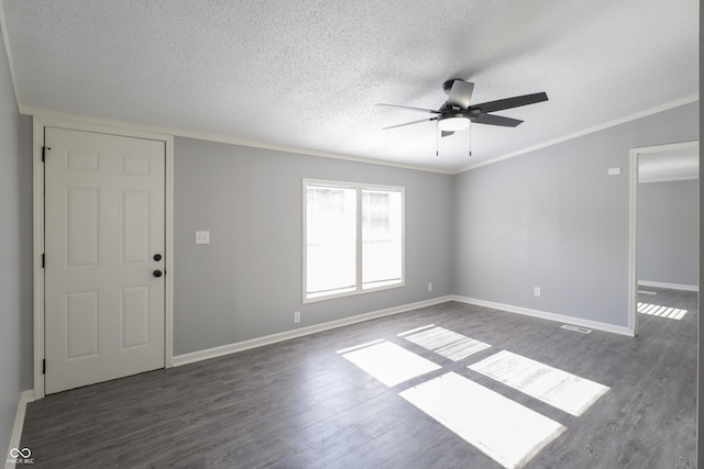 unfurnished room featuring ceiling fan, crown molding, dark hardwood / wood-style floors, and a textured ceiling