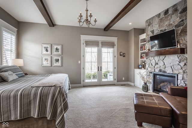 bedroom featuring light carpet, access to outside, beam ceiling, and french doors