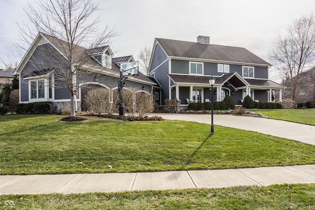 view of front of property with a porch and a front lawn