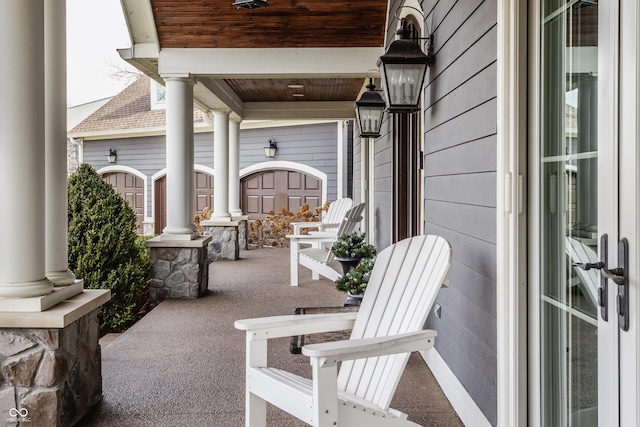 view of patio featuring a porch