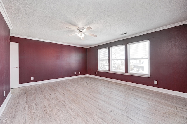 unfurnished room with crown molding and light hardwood / wood-style floors