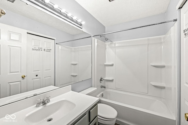 full bathroom featuring shower / bathtub combination, vanity, toilet, and a textured ceiling